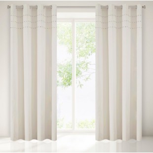 Béžový stredne zatemňujúci záves s ozdobnými kamienkami