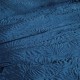 Tmavomodrý dekoračný prehoz na posteľ s prešivaním v tvare palmových vetiev