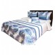 Moderný tmavo modro biely elegantný prehoz na posteľ s prešívaním a motívom palmových listov