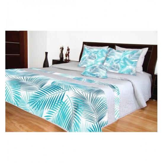 Sivý prešívaný prehoz na posteľ s modrými vetvičkami